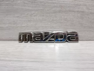 BP4K51710A Эмблема Mazda 3 BK Арт ZAP192098, вид 1