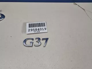 84894JU40A Эмблема крышки багажника Infiniti G 4 Арт Z317618