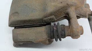41011AX60A Nissan Суппорт тормозной передний левый Nissan Micra K14 Арт E103080023, вид 3