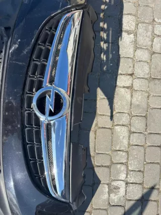 13285996 Бампер передний Opel Corsa D Арт e12621883, вид 7