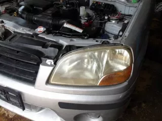  Фара левая Suzuki Ignis 1  Арт e12209968