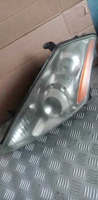 100-63800 Фара левая Nissan Murano Z50 Арт e12040890, вид 1