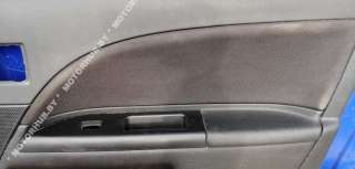 Обшивка двери (дверная карта) комплект Ford Mondeo 3 2002г.  - Фото 10