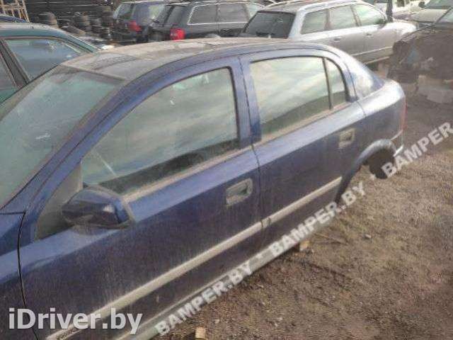 Стекло двери задней левой Opel Astra G 1999г.  - Фото 1