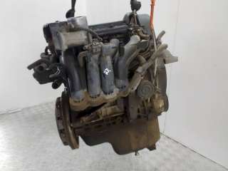 Двигатель  Volkswagen Golf 5 1.4  2008г. BUD 045173  - Фото 5