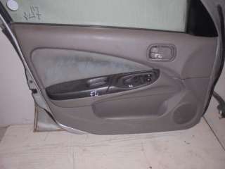  Обшивка двери передней левой к Nissan Almera N16 Арт 00000194303