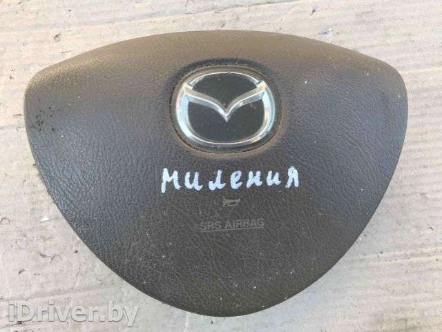 Подушка безопасности водителя Mazda Millenia 1998г.  - Фото 1