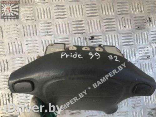 подушка безопасности водителя Kia Pride 1 1999г.  - Фото 1