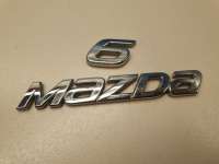 GHK151711 Эмблема крышки багажника к Mazda 6 3 Арт Z288066