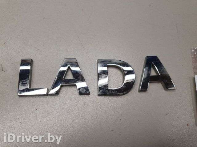 Эмблема двери багажника Lada largus 2012г.  - Фото 1