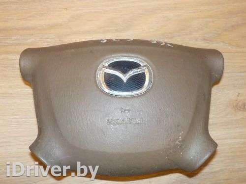 Подушка безопасности в рулевое колесо Mazda 323 BJ 1998г. BJ0F57K0090 - Фото 1