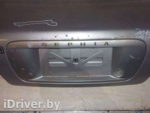 Фонарь подсветки номера Kia Sephia 1 1993г.  - Фото 1
