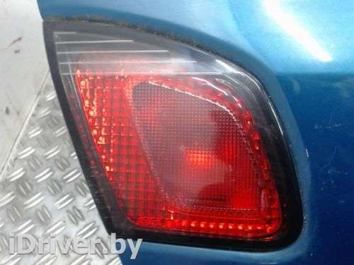фонарь крышки багажника лев Nissan Primera 11 2001г.  - Фото 1