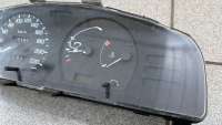 Щиток приборов (приборная панель) Nissan Sunny N14 1995г.  - Фото 3