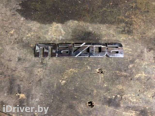 Эмблема Mazda 323 BG 1994г.  - Фото 1