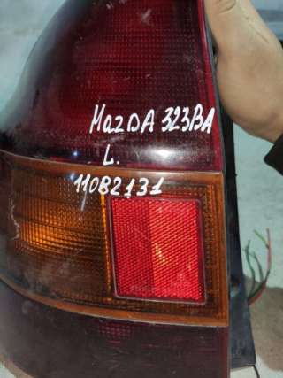 Фонарь задний левый Mazda 323 BA 1995г.  - Фото 3