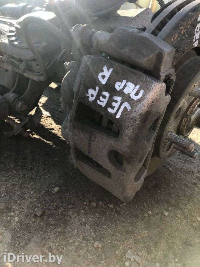 Суппорт передний правый Jeep Wrangler JK restailing 2019г. 68383240AA,68383242AA - Фото 1