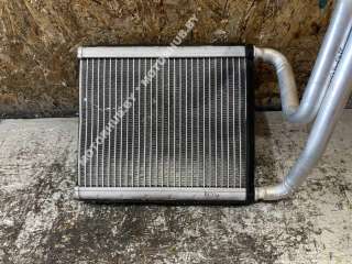 Радиатор отопителя (печки) Kia Ceed 2 2015г.  - Фото 6