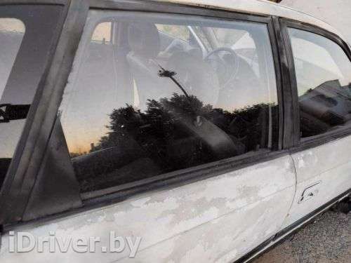 Стекло двери задней правой Opel Astra F 1993г.  - Фото 1