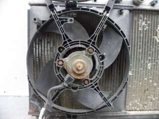 Вентилятор охлаждения (электро) Mitsubishi Carisma 1997г.  - Фото 2