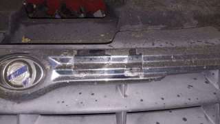 Решетка радиатора Chrysler Grand Voyager 4 2005г.  - Фото 3