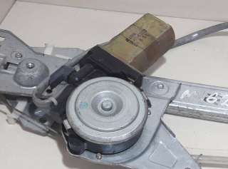 Стеклоподъемник электрический задний левый Mazda 626 GF 1999г. 36401-61822,KOITO - Фото 2
