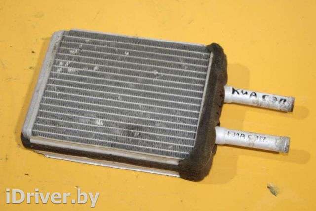 Радиатор отопителя (печки) Kia Sephia 2 1998г.  - Фото 1