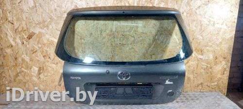 Заднее стекло Toyota Corolla E120 2003г.  - Фото 1