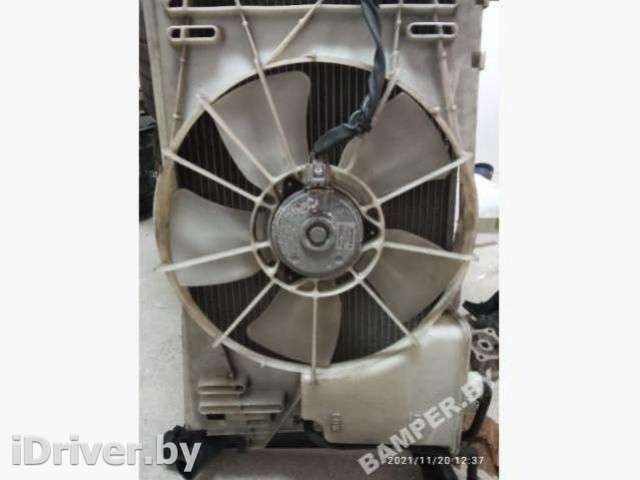 Вентилятор радиатора Toyota Corolla E120 2005г.  - Фото 1