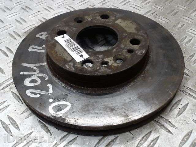 диск тормозной перед прав Kia Rio 1 2001г.  - Фото 1