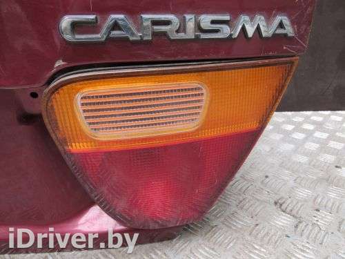 Фонарь крышки багажника правый Mitsubishi Carisma 1997г.  - Фото 1