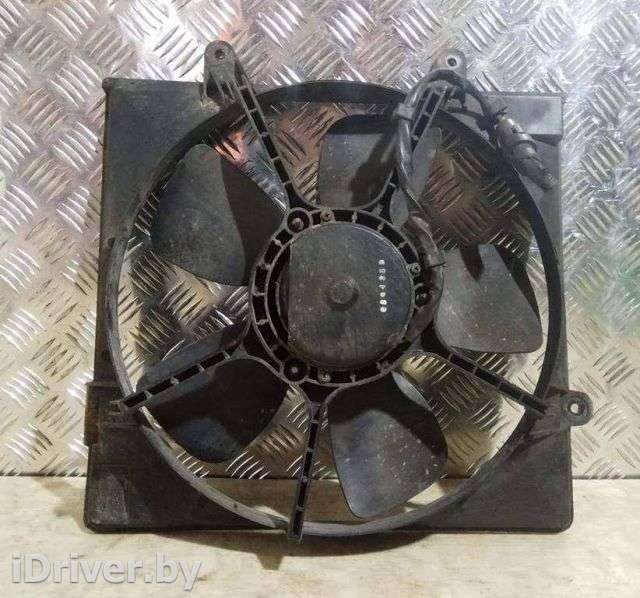 Вентилятор радиатора Kia Carnival 1 2003г. 0K55215025 - Фото 1