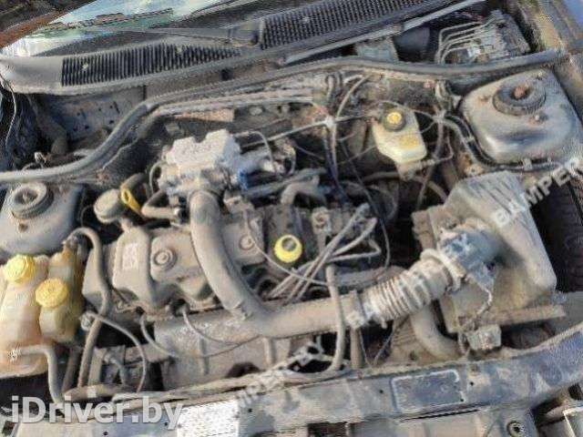 КПП механическая (МКПП) 5-ступенчатая Ford Escort 6 1997г.  - Фото 1