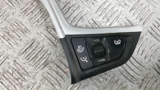Кнопки руля Opel Astra J 2014г.  - Фото 2