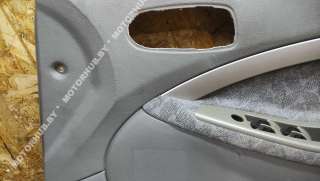 Обшивка двери передней правой (дверная карта) Chevrolet Lacetti 2006г. 96556322 - Фото 7