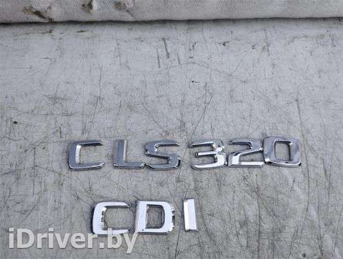 Эмблема Mercedes CLS C219 2009г.  - Фото 1