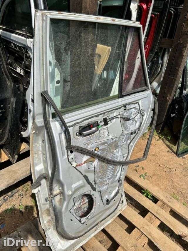 Ограничитель открывания двери задней Toyota Rav 4 2 2003г.  - Фото 1