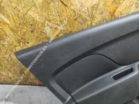 Обшивка двери задней левой (дверная карта) Renault Sandero 1 2013г.  - Фото 4