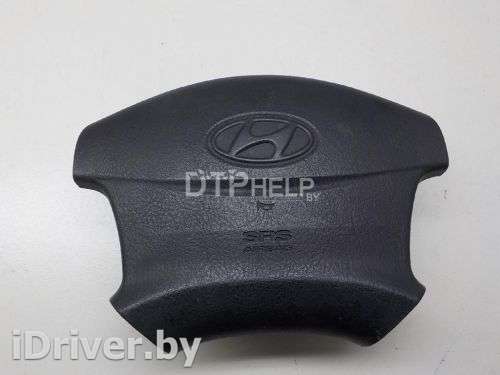 Подушка безопасности в рулевое колесо Hyundai Trajet 2001г. 569003A000LK - Фото 1