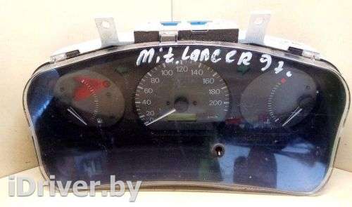 Щиток приборов (приборная панель) Mitsubishi Lancer 6 1997г. MR233049 - Фото 1