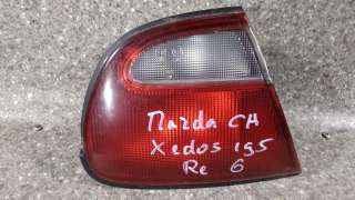  Фонарь крышки багажника левый к Mazda Xedos 6 Арт 00225006004