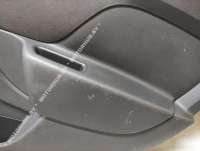 Обшивка двери задней правой (дверная карта) Renault Sandero 1 2013г.  - Фото 4