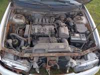 Головка блока цилиндров Mazda 626 GE 1996г.  - Фото 2