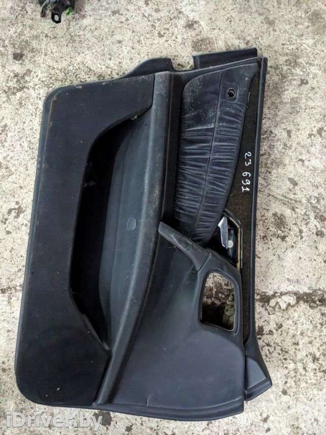 Обшивка двери передней левой (дверная карта) Mercedes E W210 1998г.  - Фото 1