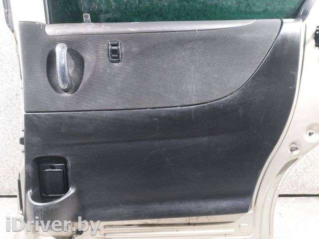 Обшивка двери задней правой (дверная карта) Mazda MPV 2 2005г.  - Фото 1