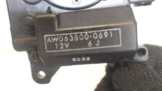 Моторчик заслонки печки Subaru Tribeca 2008г. 0638000691 - Фото 2