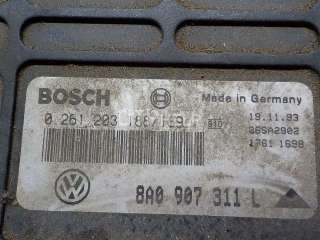 Блок управления двигателем Volkswagen Passat B4 1995г. 8A0907311L - Фото 9