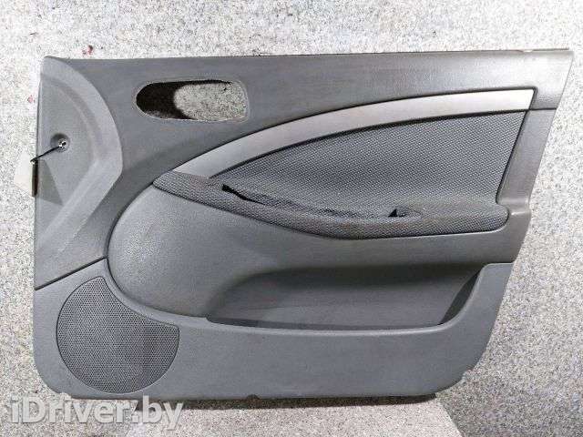 Обшивка двери передней правой (дверная карта) Chevrolet Nubira 2007г.  - Фото 1