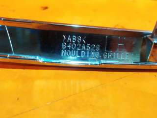 накладка решетки радиатора Mitsubishi ASX restailing 2012г. 6402a529 - Фото 12