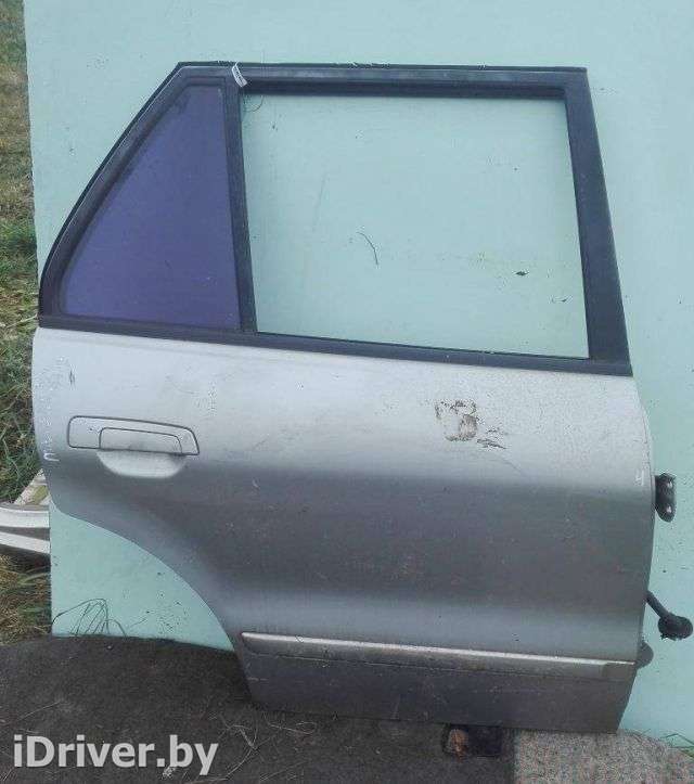 уплотнитель двери задний правый Mitsubishi Galant 8 1999г.  - Фото 1